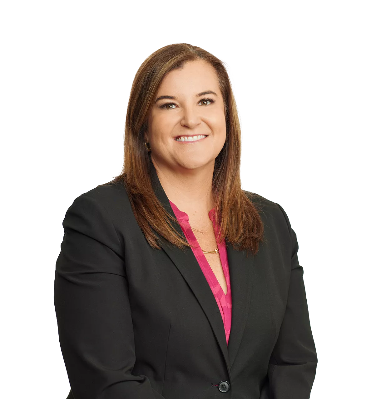 woman with straight brown hair in a black blazer and pink blouse, smiling at the camera, on a white background.