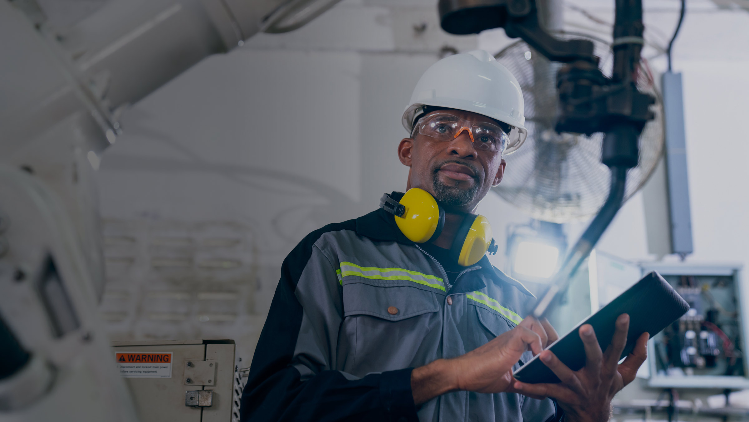 A man in working with safety helmet