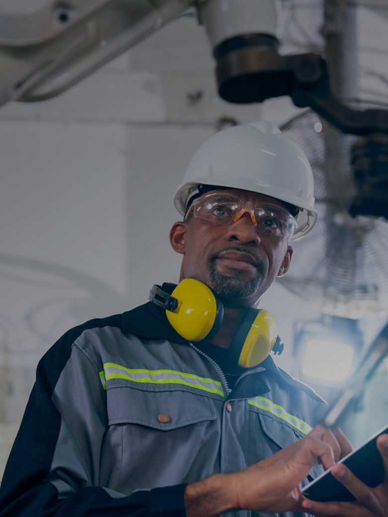 A man in working with safety helmet