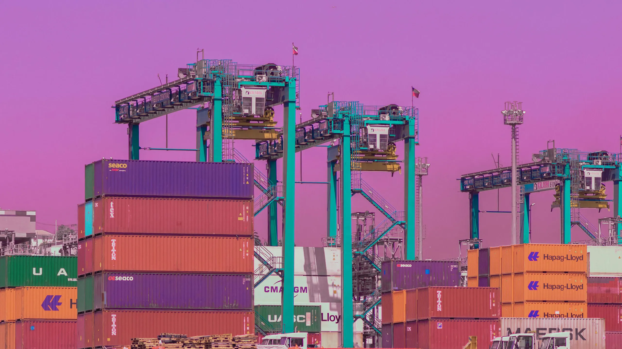 ship yard with storage containers and crane lifts