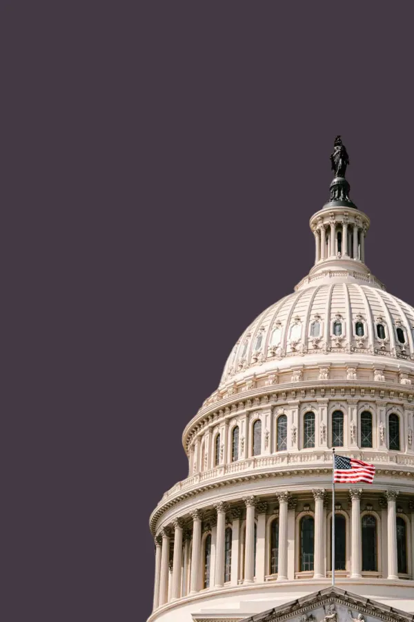state-capitol-building-dome-with-US-flag-blowing