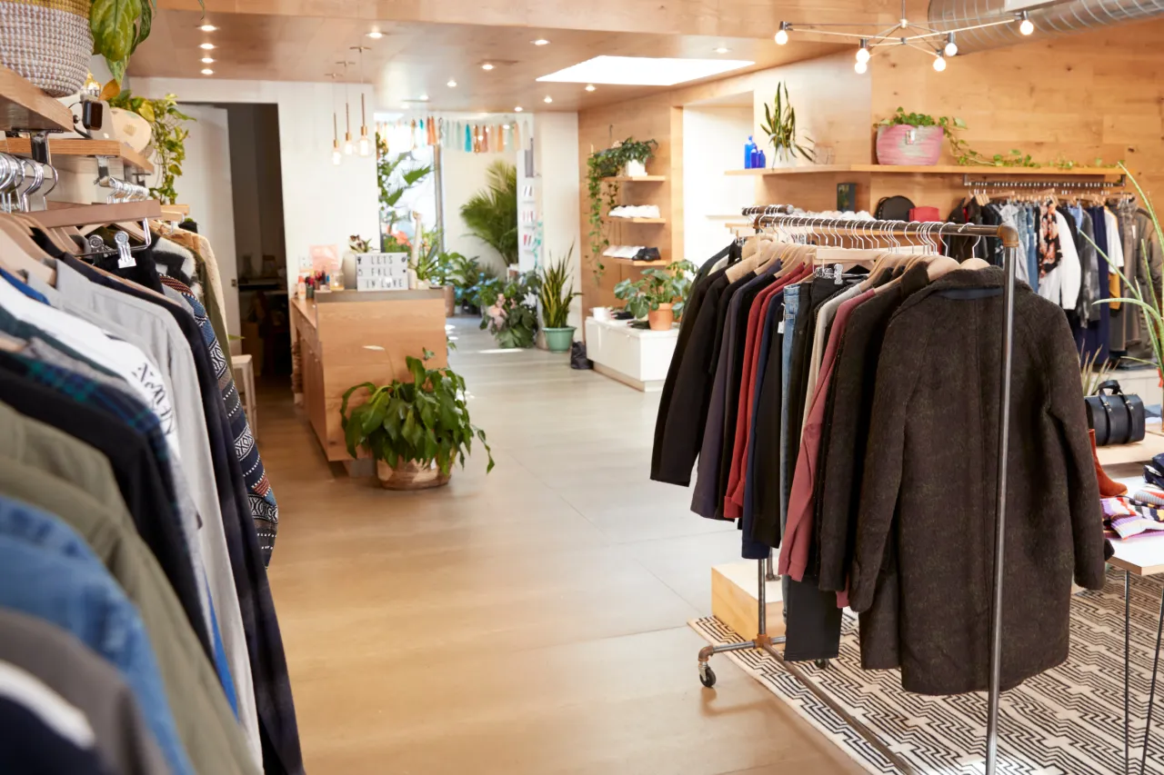 bright-modern-clothing-boutique-with-wooden-floors