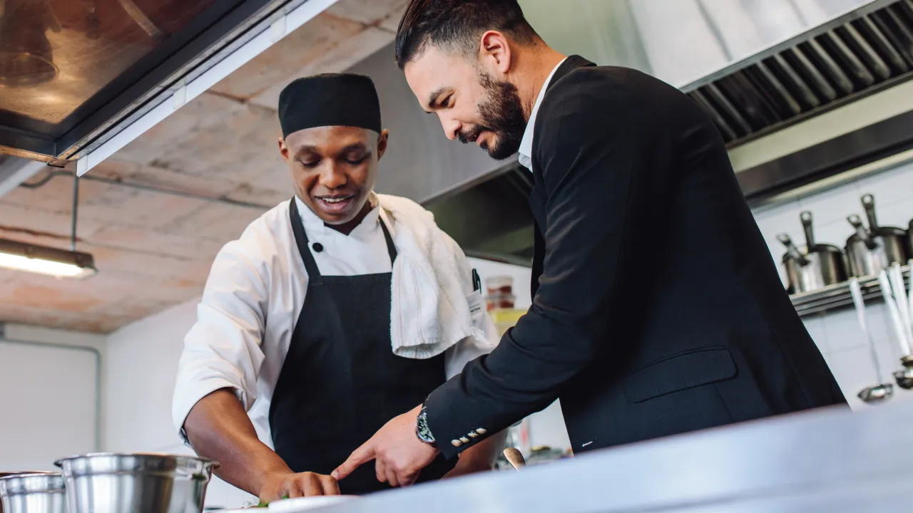 Chef preparing food in a commercial kitchen
