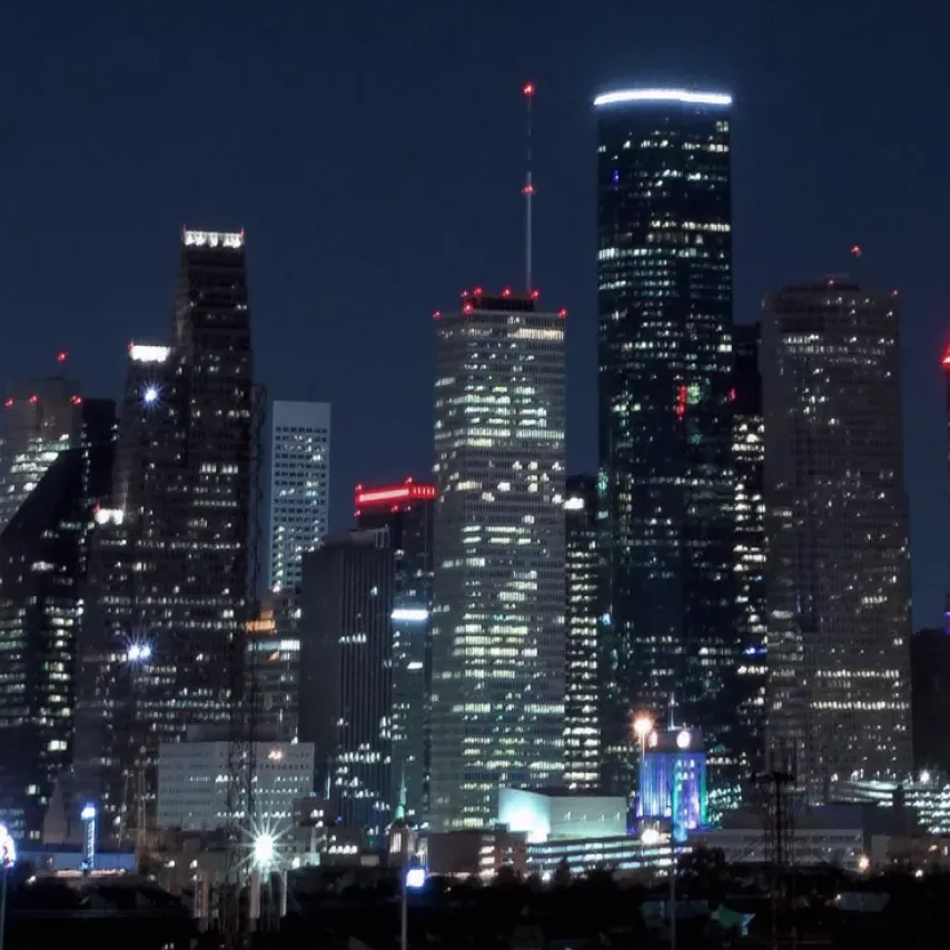 city of Houston nightime skyline building lights.