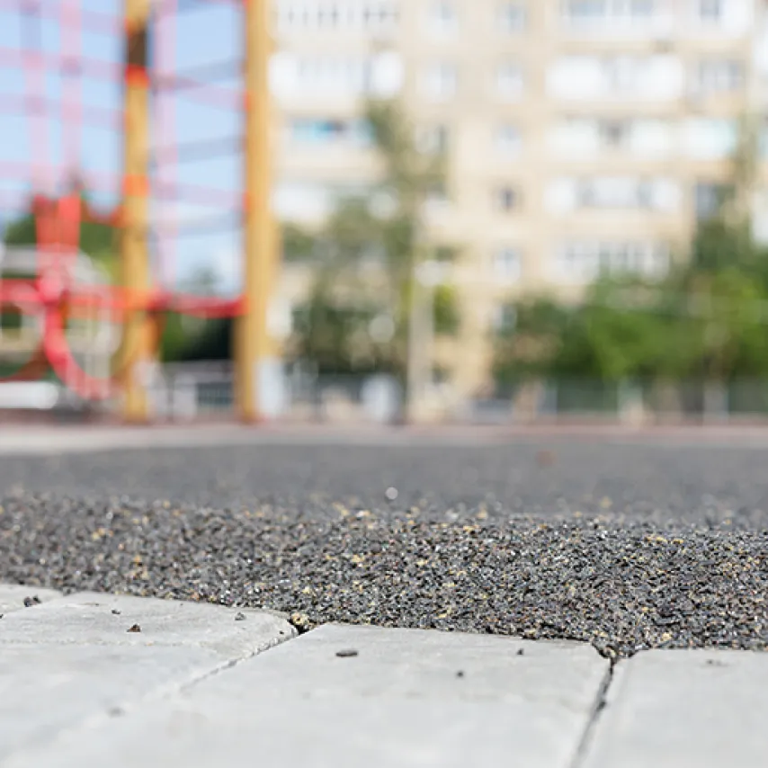 close up of rubber based playground filling.