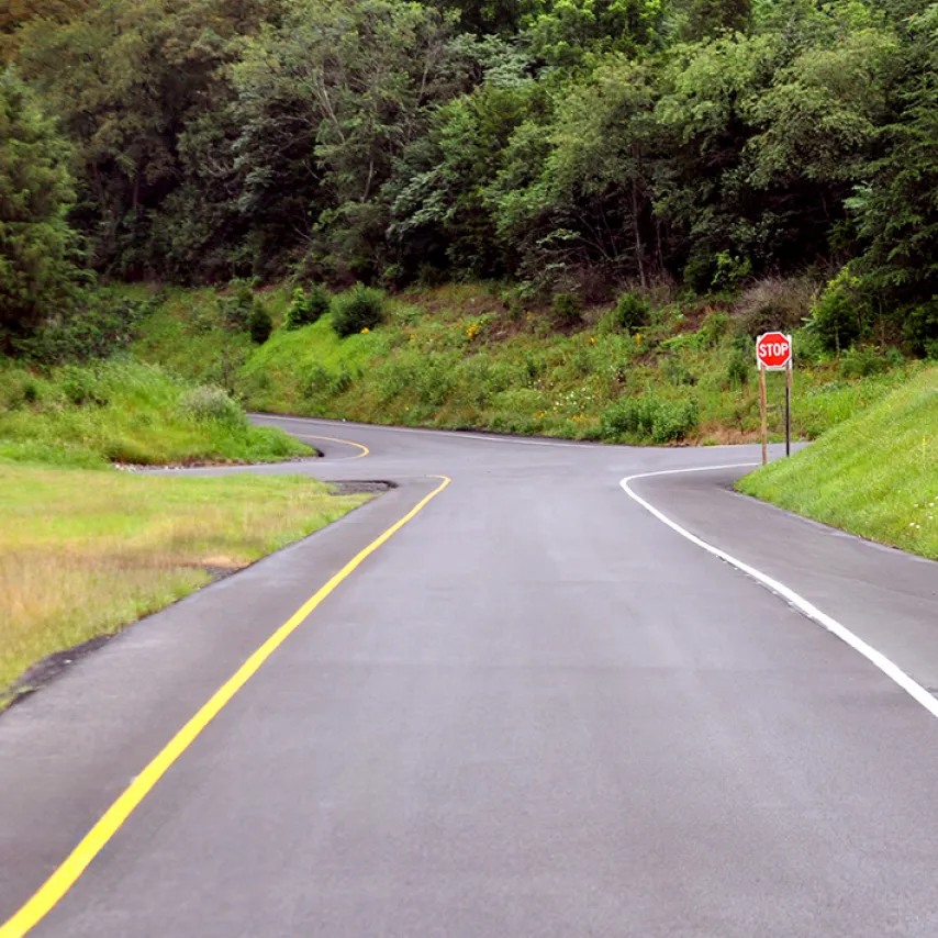rural road intersection newly paved.