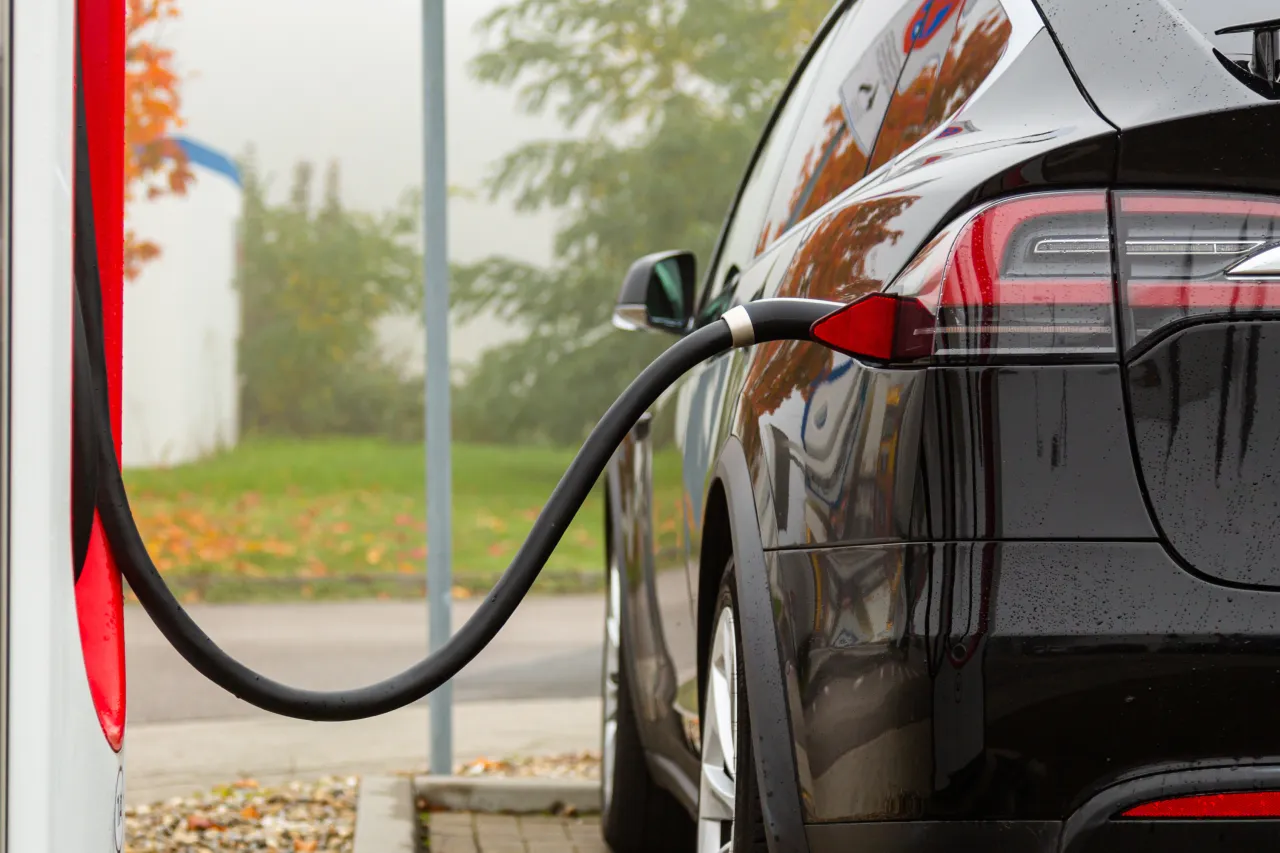 ev car charging at charging station.