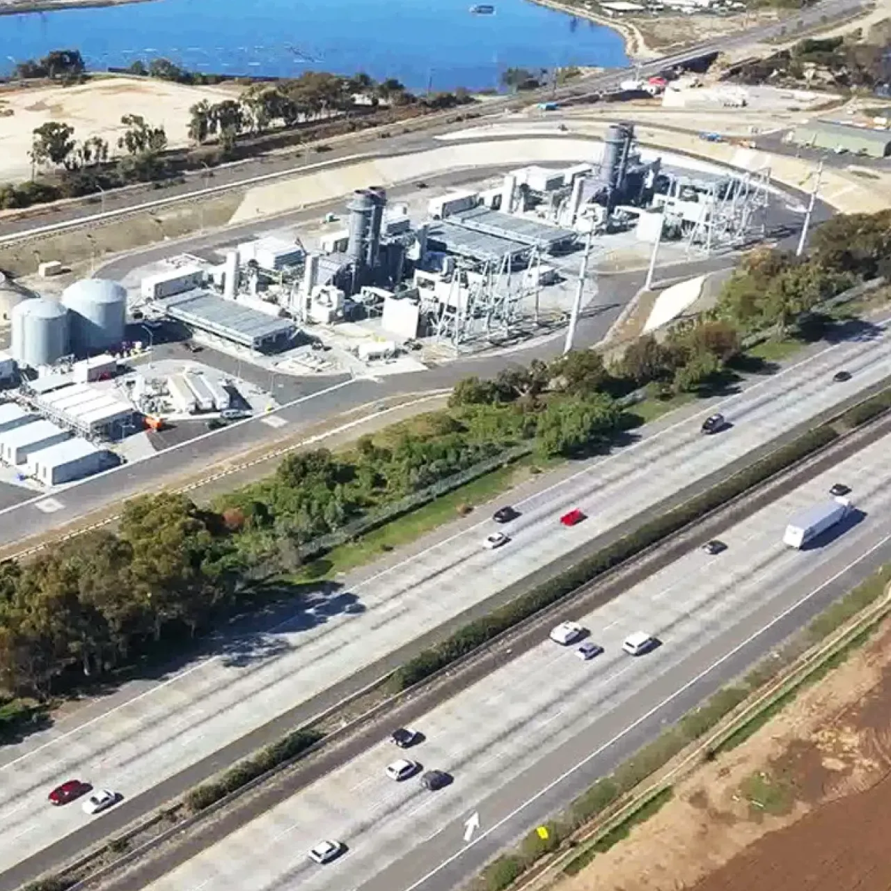 side-ariel-view-of-carlsbad-plant-next-to-highway-small