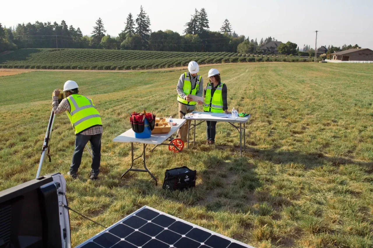 solar farm planning and installation in agricultural field.