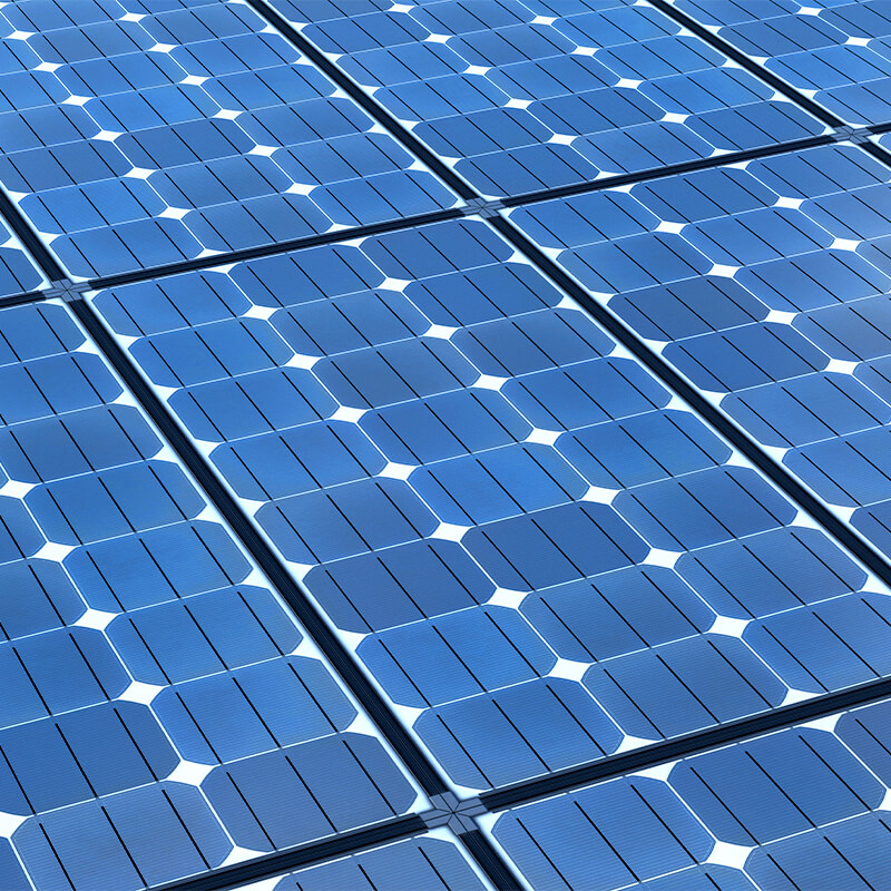 rows of blue solar panels arranged side by side, capturing sunlight for energy.