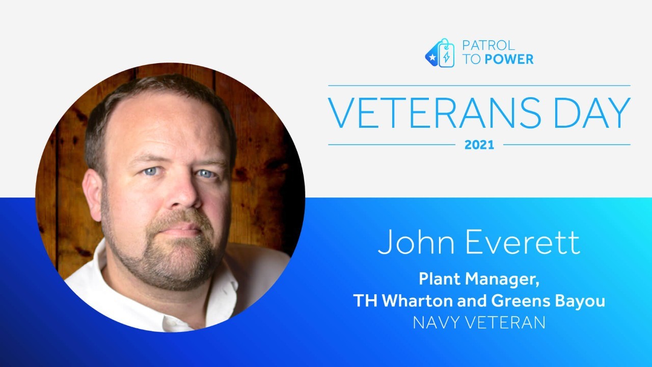 a man with short hair and a beard is featured on a Veterans Day 2021 recognition graphic for John Everett.