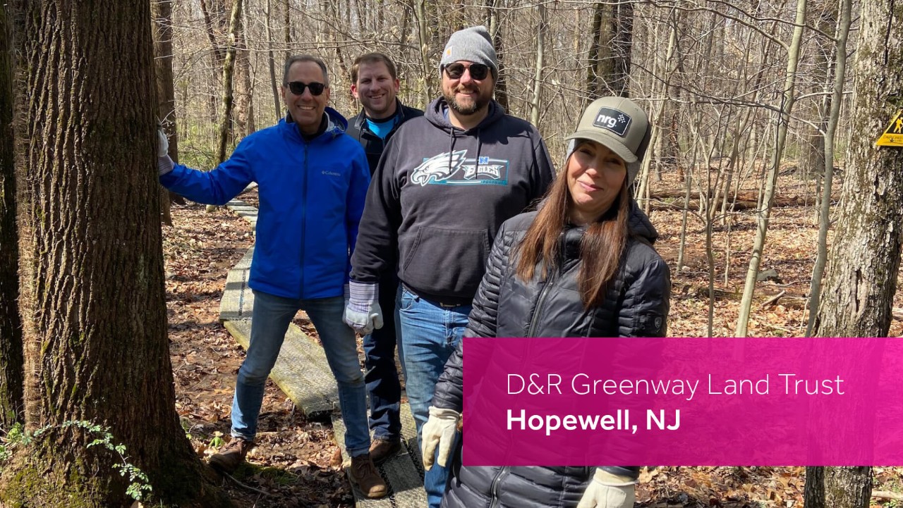 four people in jackets and gloves stand in a wooded area; text reads D&R Greenway Land Trust, Hopewell, NJ..